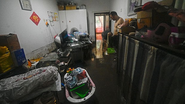 More than 52,000 people had to be evacuated from Beijing's Mentougou district as flood waters gushed into homes.
Mandatory Credit:	Pedro Pardo/AFP/Getty Images
