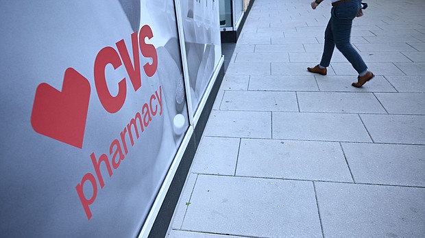 CVS said that it "must take difficult steps to reduce expenses."
Mandatory Credit:	Brendan Smialowski/AFP/Getty Images
