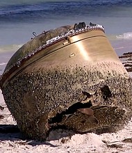 The object had intrigued local residents.
Mandatory Credit:	Core News/Reuters