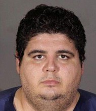 Investigators from Los Angeles Police Department said Jesus Tabares "was providing massage services" when he allegedly sexually assaulted his victim.
Mandatory Credit:	LAPD/KCAL
