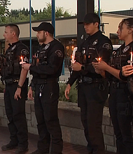 Candlelight Vigil held for Deputy Charles Dozé who is in Critical Condition