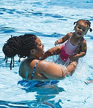 Sharde Robinson and her 1-year-old daughter, Alora Rasor, beat the heat in the Blackwell Pool last Saturday. The pool is open to the public throughout the summer from noon to 5 p.m. Saturday, 1 to 5 p.m. Sunday and holidays, and 1 to 4:30 p.m. Monday through Friday for open swimming, 5 to 7 p.m. for family swims and 7 to 8 p.m. for adult swim.