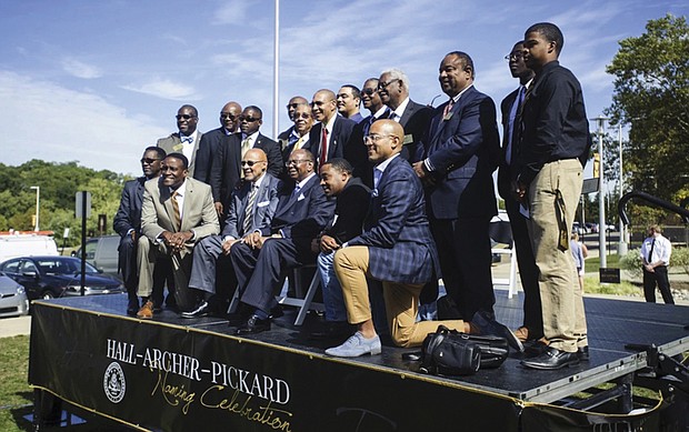 In this 2017 photo, generations of Alpha Phi Alpha Fraternity members pose for a photograph during the Hall-Archer-Pickard Naming Celebration atWestern Michigan University in Kalamazoo, Mich. Officials of the oldest historically Black collegiate fraternity in the U.S. said it is relocating a planned convention in two years from Florida because of what it described as Gov. Ron DeSantis’ administration’s “harmful, racist and insensitive” policies toward African-Americans.