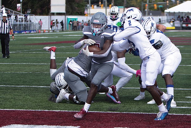 Jada Byers, aided by Justin Meade and his powerful “Escort Service,” was brilliant in 2022, helping the North Siders to a 9-2 record and an NCAA berth. In this photo, Byers scores a touchdown Oct. 8, 2022 in the Panthers’ win against Elizabeth City.