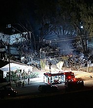 First responders at the scene of a helicopter crash in Riverside County, California, on Sunday.
Mandatory Credit:	KABC
