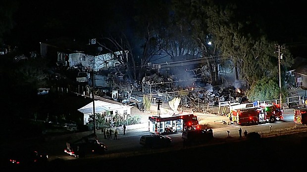 First responders at the scene of a helicopter crash in Riverside County, California, on Sunday.
Mandatory Credit:	KABC