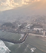 An aerial view of damaged areas amidst wildfires in Maui, Hawaii on August 9 in this screenshot taken from a social media video.
Mandatory Credit:	Vince Carter/Reuters
