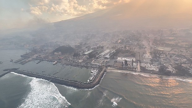 An aerial view of damaged areas amidst wildfires in Maui, Hawaii on August 9 in this screenshot taken from a social media video.
Mandatory Credit:	Vince Carter/Reuters