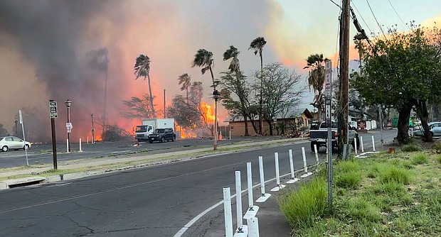Smoke and flames rise in Lahaina, Maui County, Hawaii, August 8 in this still image from video obtained from social media.
Mandatory Credit:	Jeff Melichar/TMX/Reuters