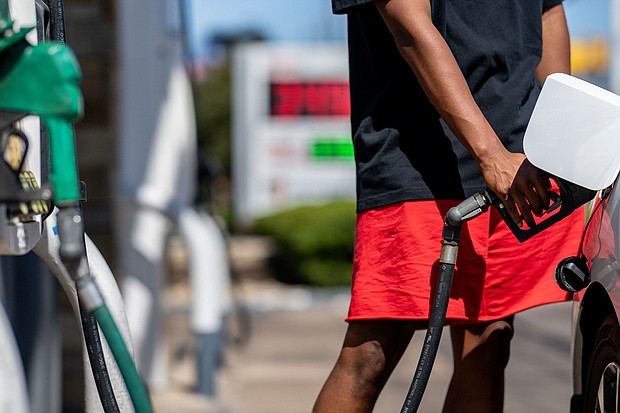 A person pumps gas at a Shell gas station on August 3 in Austin, Texas. Gas stations around the country have boosted prices by an average of 26 cents a gallon over the past month as irregular temperatures have made fuel-making more challenging due to the slowing of cooling processes needed to refine crude oil.
Mandatory Credit:	Brandon Bell/Getty Images