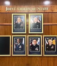 The wall at the Pentagon featuring the Joint Chiefs of Staff. Three of the positions are vacant due to GOP Sen. Tommy Tuberville's hold on Senate-confirmed officers.
Mandatory Credit:	Haley Britzkey/CNN