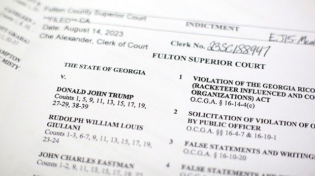 The indictment in Georgia against former President Donald Trump is photographed Monday, Aug. 14, 2023.
Mandatory Credit:	Rebecca Wright/CNN