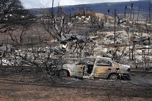 Destroyed property is seen in Lahaina, Hawaii, following a deadly wildfire that caused heavy damage days earlier.