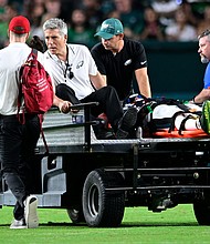 Philadelphia Eagles wide receiver Tyrie Cleveland is brought off the field after an injury during the second half of the NFL preseason football game.
Mandatory Credit:	Derik Hamilton/AP