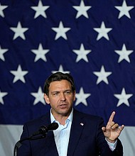 Florida Gov. Ron DeSantis speaks on August 6 in Cedar Rapids, Iowa.
Mandatory Credit:	Charlie Neibergall/AP