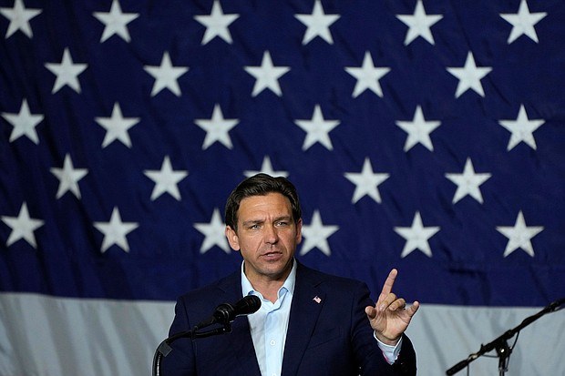 Florida Gov. Ron DeSantis speaks on August 6 in Cedar Rapids, Iowa.
Mandatory Credit:	Charlie Neibergall/AP