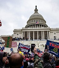 Pro-Trump supporters storm the U.S. Capitol following a rally with President Donald Trump on January 6, 2021 in Washington, DC.
Mandatory Credit:	Samuel Corum/Getty Images/FILE