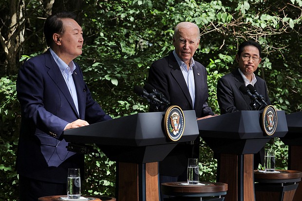 U.S. President Joe Biden holds a joint press conference with Japanese Prime Minister Fumio Kishida and South Korean President Yoon Suk Yeol during the trilateral summit at Camp David near Thurmont, Maryland, on August 18.
Mandatory Credit:	Jim Bourg/Reuters