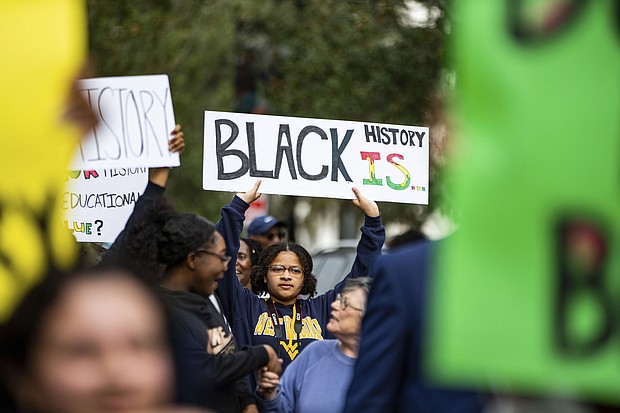Demonstrators gather in February in Tallahassee, Florida, during a protest over Gov. Ron DeSantis' rejection of a high school African American history course that included lessons about reparations.
Mandatory Credit:	Alicia Devine/Tallahassee Democrat/AP