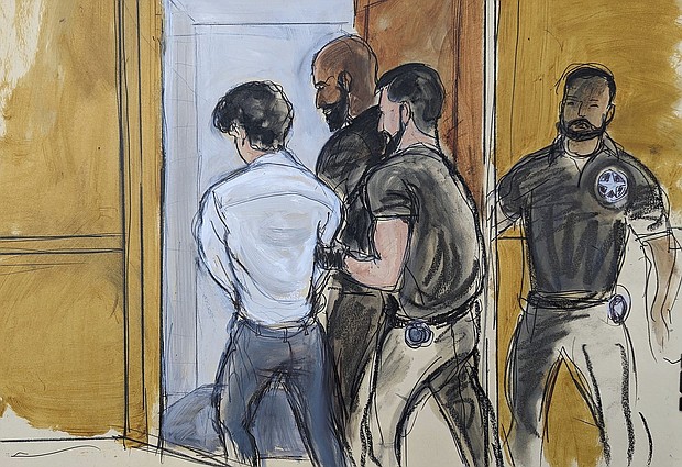 In this sketch, in Federal Court in New York, August 11, FTX founder Sam Bankman-Fried is escorted by court officers from the courtroom.
Mandatory Credit:	Elizaberth Williams/AP