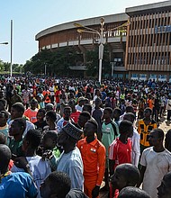 Volunteers gather near General Seyni Kountche Stadium in Niamey, Niger, on August 19, responding to the call for civilian auxiliaries to potentially mobilize in support of the armed forces.
Mandatory Credit: