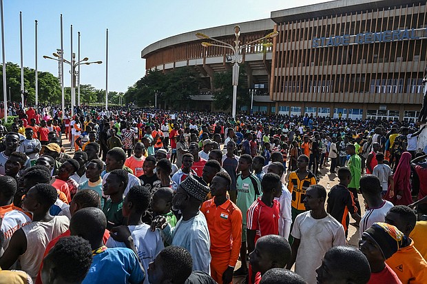 Volunteers gather near General Seyni Kountche Stadium in Niamey, Niger, on August 19, responding to the call for civilian auxiliaries to potentially mobilize in support of the armed forces.
Mandatory Credit: