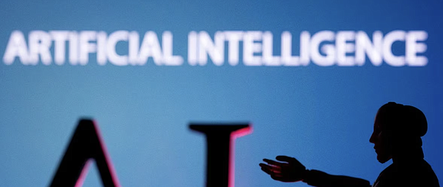 AI (Artificial Intelligence) letters and robot miniature in this illustration taken, June 23, 2023. REUTERS/Dado Ruvic/Illustration/File photo Acquire Licensing Rights