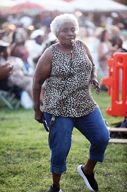 Elaine Brown, 71, of Jackson Ward came prepared to party with her whistle in tow.