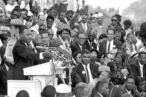Dr. Martin Luther King Jr., head of the Southern Christian Leadership Conference, speaks to thousands during his “I Have a Dream” speech in front of the Lincoln Memorial for the March on Washington for Jobs and Freedom in Washington on Aug. 28, 1963.