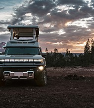 Front profile of the GMC HUMMER EV EarthCruiser Upfit by EarthCruiser.