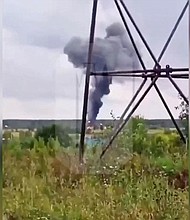 An explosion likely brought down an aircraft purportedly carrying the Wagner boss, Yevgeny Prigozhin, flight data and video analysis suggest. A view shows smoke rising above the plane following an alleged air accident in the Tver region of Russia.
Mandatory Credit:	Ostorozhno Novosti/Reuters