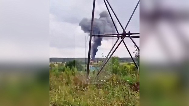 An explosion likely brought down an aircraft purportedly carrying the Wagner boss, Yevgeny Prigozhin, flight data and video analysis suggest. A view shows smoke rising above the plane following an alleged air accident in the Tver region of Russia.
Mandatory Credit:	Ostorozhno Novosti/Reuters