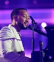 John Legend’s children are still too young to be full on activists, but he and his wife Chrissy Teigen are starting early to impress upon them the importance of civic engagement and caring for community.
Mandatory Credit:	Derek White/Getty Images
