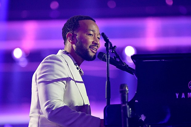 John Legend’s children are still too young to be full on activists, but he and his wife Chrissy Teigen are starting early to impress upon them the importance of civic engagement and caring for community.
Mandatory Credit:	Derek White/Getty Images