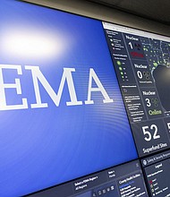 Screens display information on Hurricane Ian inside the National Response Coordination Center at FEMA headquarters in September 2022.
Mandatory Credit:	Kevin Dietsch/Getty Images