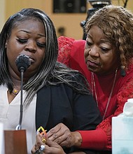 Wandrea “Shaye” Moss, a former Georgia election worker, is comforted by her mother, Ruby Freeman, right, as the House Select Committee investigating the Jan. 6 attack on the U.S. Capitol holds a hearing June 2022 at the Capitol in Washington.