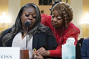 Wandrea “Shaye” Moss, a former Georgia election worker, is comforted by her mother, Ruby Freeman, right, as the House Select Committee investigating the Jan. 6 attack on the U.S. Capitol holds a hearing June 2022 at the Capitol in Washington.