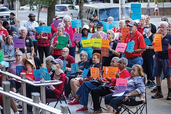 More than 100 members of Richmonders Involved to Strengthen Our Communities (RISC) and the Richmond chapter of Virginia Caucus of Rank-and-File Educators (VCORE) assembled outside City Hall’s Marshall Street entrance for a prayer vigil Tuesday evening.