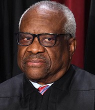 Associate US Supreme Court Justice Clarence Thomas poses for the official photo at the Supreme Court in Washington, DC on October 7, 2022.
Mandatory Credit:	Olivier Douliery/AFP/Getty Images