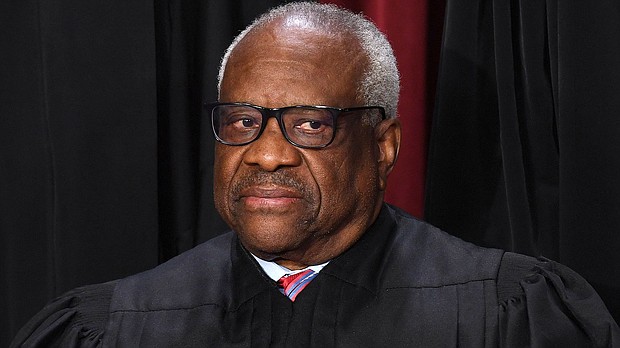 Associate US Supreme Court Justice Clarence Thomas poses for the official photo at the Supreme Court in Washington, DC on October 7, 2022.
Mandatory Credit:	Olivier Douliery/AFP/Getty Images