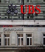 UBS expects to shed around 3,000 jobs in Switzerland to help it cut $10 billion in costs as it undertakes a sweeping overhaul following its emergency rescue of Credit Suisse earlier this year.
Mandatory Credit:	Fabrice Coffrini/AFP/Getty Images