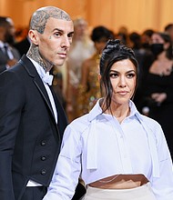 Travis Barker and Kourtney Kardashian are pictured here in New York in 2022. Kardashian has shared she underwent a medical complication during her pregnancy.
Mandatory Credit:	Theo Wargo/WireImage/Getty Images