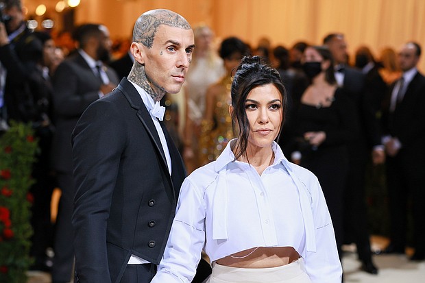 Travis Barker and Kourtney Kardashian are pictured here in New York in 2022. Kardashian has shared she underwent a medical complication during her pregnancy.
Mandatory Credit:	Theo Wargo/WireImage/Getty Images