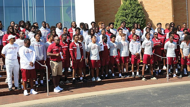 VUU’s football team, coaches and staff stand in front of the Football Hall of Fame in Canton, Ohio. The team trounced Morehouse College, 45-13, in the HBCU Hall of Fame Classic.