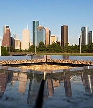 City of Houston’s skyline as viewed from the Houston Police Officers Memorial by Jesús Bautista Moroles. Photo by Alex Barber.