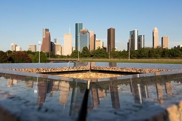 City of Houston’s skyline as viewed from the Houston Police Officers Memorial by Jesús Bautista Moroles. Photo by Alex Barber.