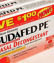 In this 2006 photo, Sudafed PE nasal decongestant is displayed on a shelf at a Walgreens store in Chicago, Illinois. Phenylephrine, a popular ingredient in many over-the-counter allergy and cold medicines, is ineffective in tablet form, an independent advisory committee to the US Food and Drug Administration unanimously agreed on September 12.
Mandatory Credit:	Tim Boyle/Getty Images/File