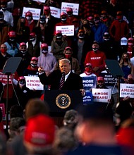 Then-President Donald Trump speaks to supporters at a rally in Bemidji, Minnesota, on September 18, 2020. A liberal group filed a lawsuit to block former President Donald Trump from the 2024 presidential ballot in Minnesota.
Mandatory Credit:	Stephen Maturen/Getty Images