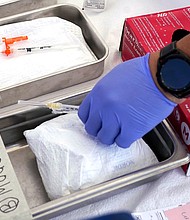 New Covid-19 vaccines are available from Moderna and Pfizer/BioNTech for everyone 6 months and older following approval from the US Centers for Disease Control and Prevention.
Mandatory Credit:	Mark J. Terrill/AP