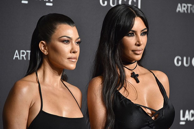 (From left) Kourtney Kardashian Barker and Kim Kardashian in Los Angeles in 2018.
Mandatory Credit:	David Crotty/Patrick McMullan/Getty Images